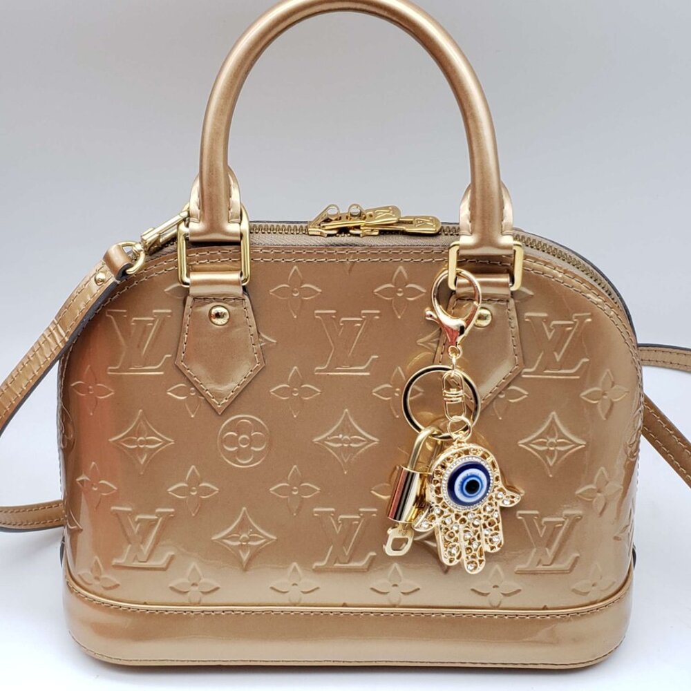 Louis Vuitton Gold Lock 🔒 Authentic LV Key + Unbranded Evil Eye Bag Charm - Picture 7 of 7